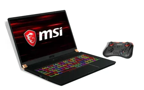 ordinateur portable gamer avec un manette