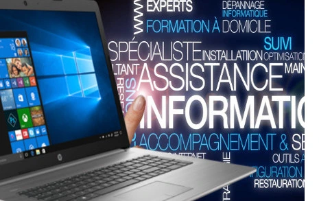 ordinateur et des mots en fond