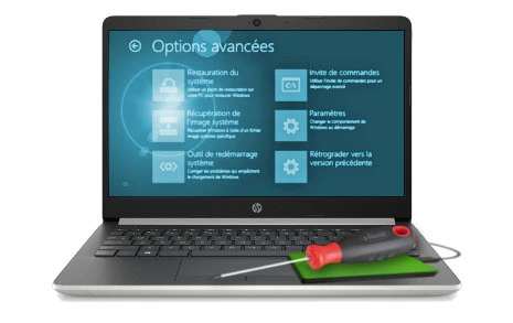 ordinateur portable avec un tournevis